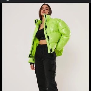 Neon green woman’s puffer coat